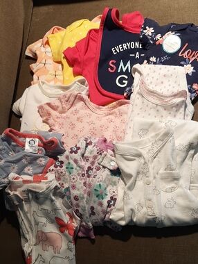 11 Assorted Onesies. Newborn to 3/6 Month